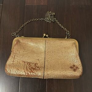 Patricia Nash
Italian leather 
clutch purse with snap closure and chain handle
